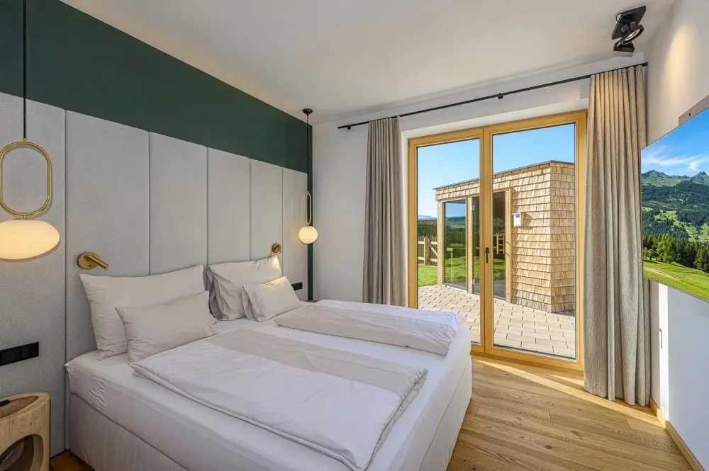KITZIMMO-Luxus-Apartmenthaus in einzigartiger Top-Sonnenlage kaufen - Immobilien Hollersbach.